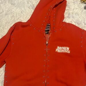 Broken Promises Orange Studded Zip Hoodie